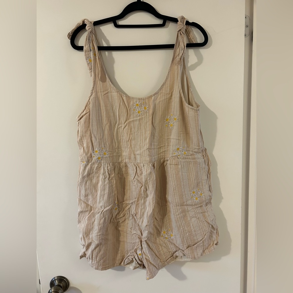 Beige Sleeveless Romper with Floral Embroidery